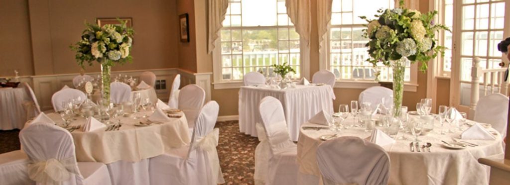 Photo of the Bar Harbor Inn Porcupine Room set up for a wedding reception.