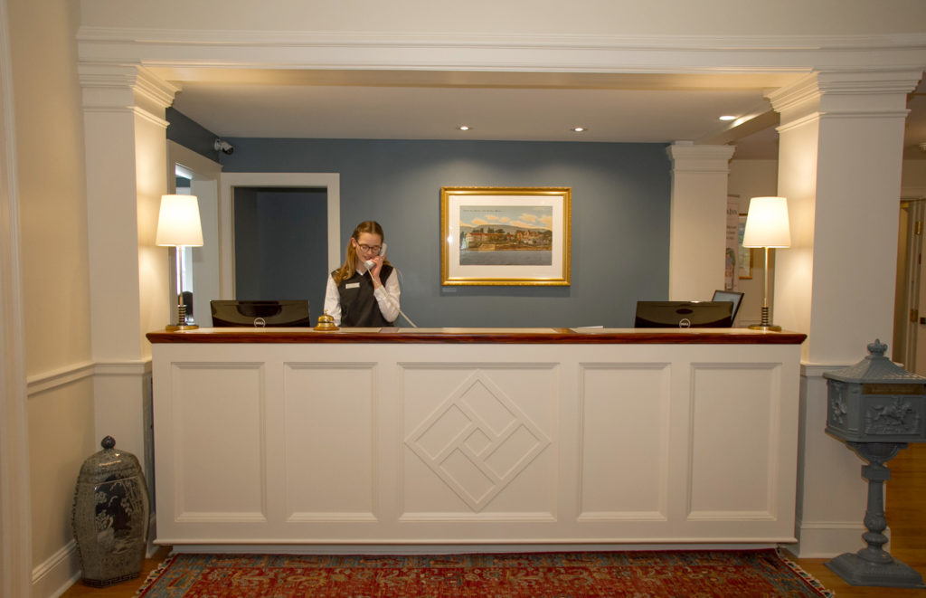 Photo of the front desk/reception area of the Bar Harbor Inn in Bar Harbor Maine